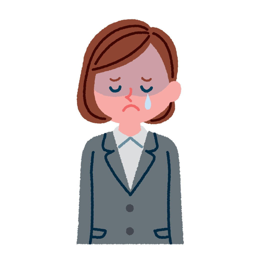 職場で泣く女性